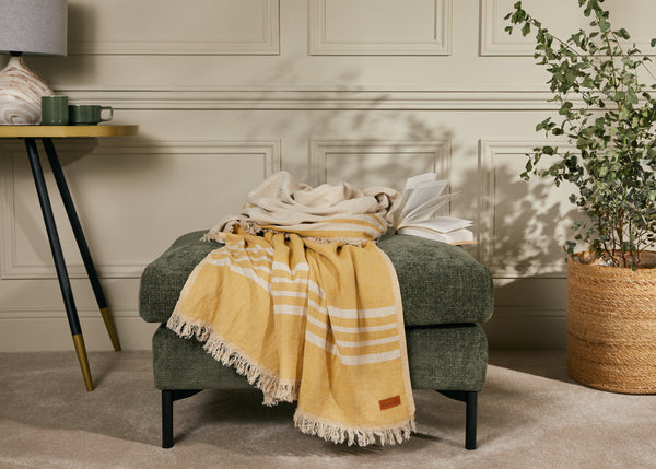 Mustard yellow arthur throw on a pouffe - Bercail